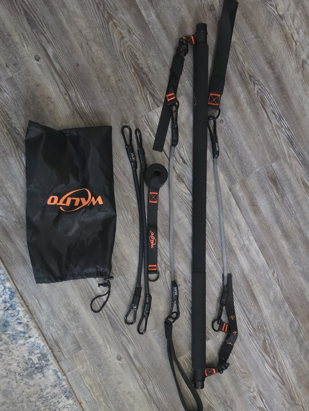 Walito Suspension Pilates Bar in Black with Orange Accents